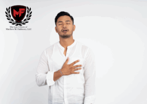 Man on white background, holding his chest with relief